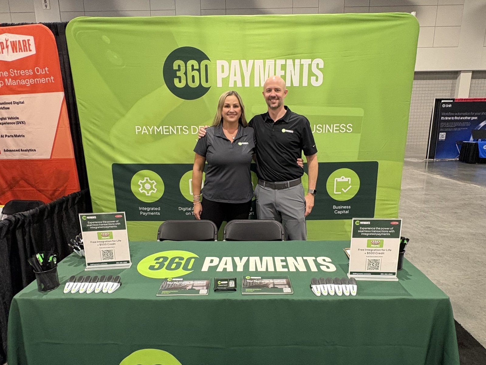 Two 360 Payments team members at their booth at ASTA Expo 2026, next to the Shop-Ware banner